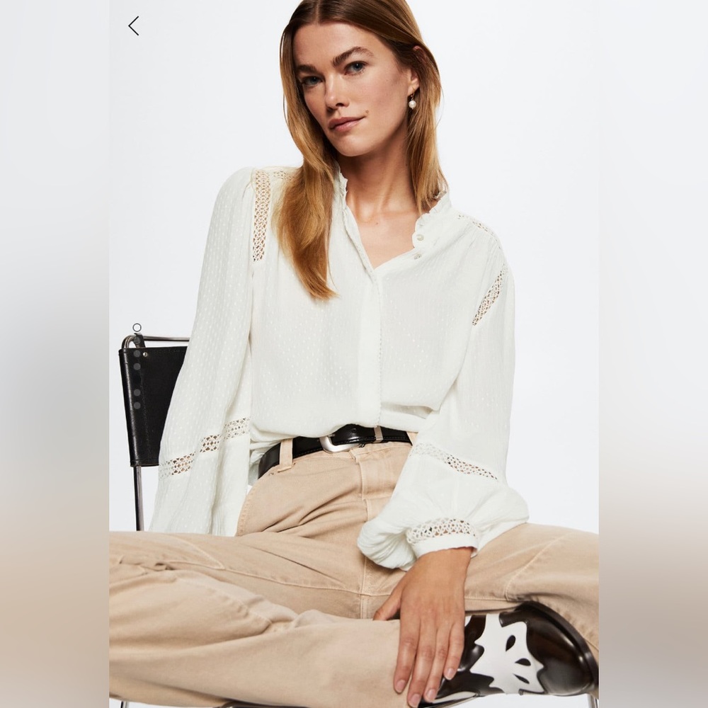 Romantic white open work blouse.